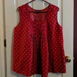 Red and white sleeveless blouse